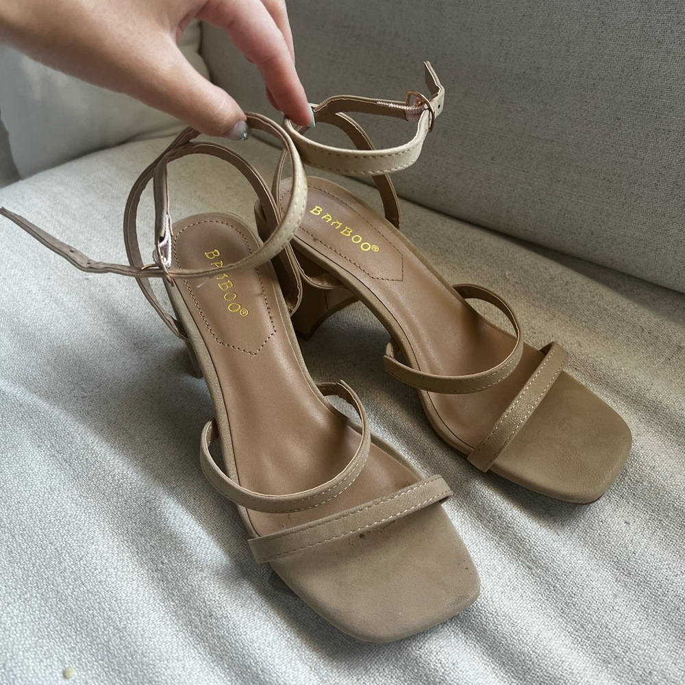 Tan strappy heeled sandals